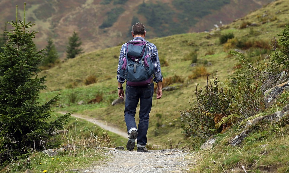 Person hiking in countryside