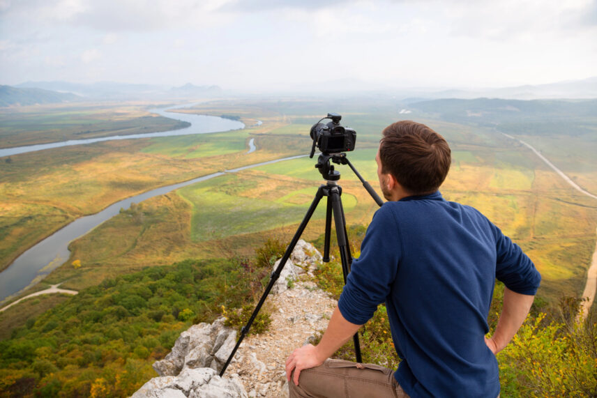 man taking photos